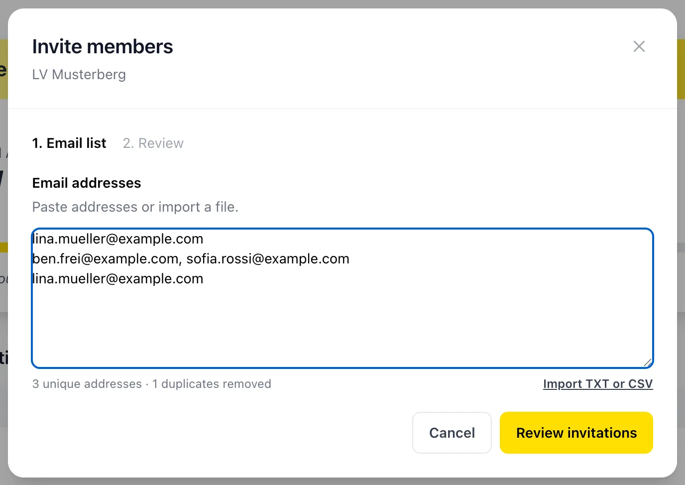 Invite members dialog with a pasted email list